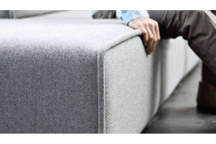 Characteristic piped edges, shown in light grey felt