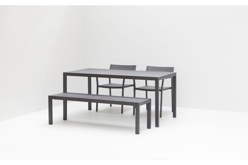 The Eos bench is a versatile outdoor bench made from powder-coated aluminium that won’t rust over time with plastic floor glides
