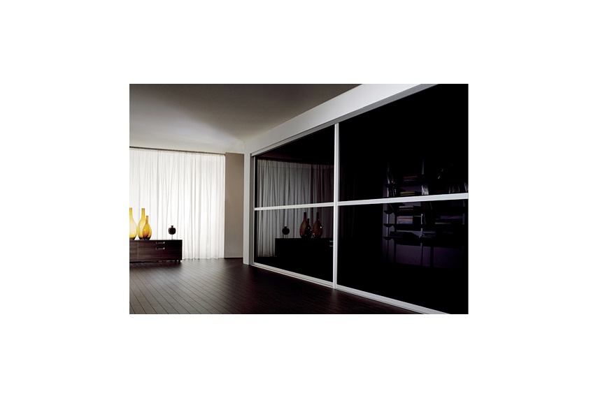 Sliding Door in living room, using LACOBEL Classic Black.