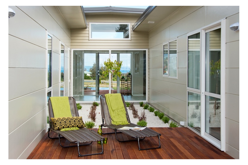 Stria® Cladding's wide panel format allows you to cover the wall height quickly.