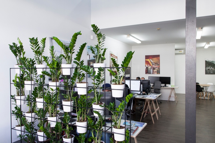 The Mobile Stacked Plant Wall introduces greenery into the working environment with interior partitioning.
