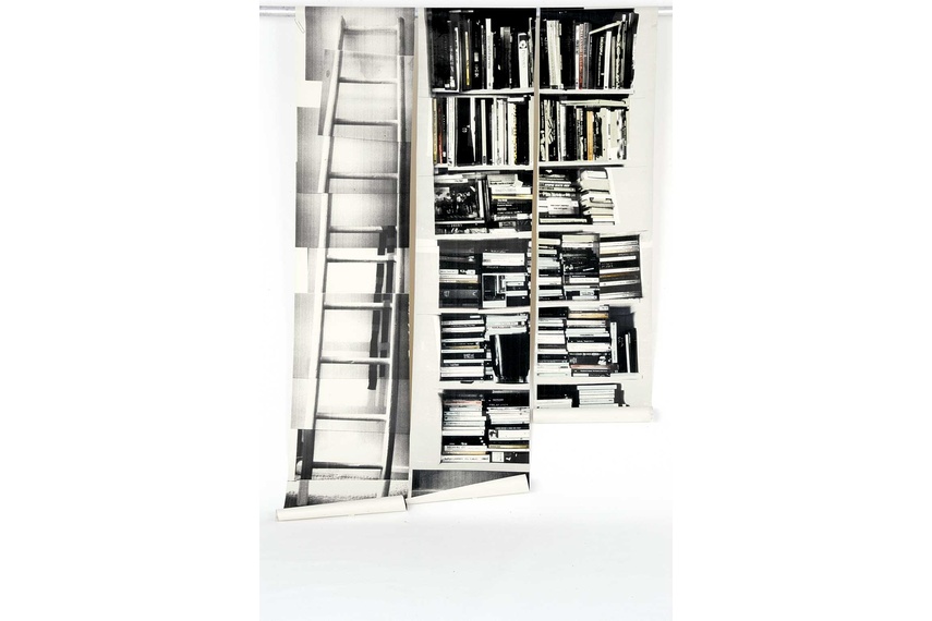 Fake bookshelf wallpaper designed by Deborah Bowness