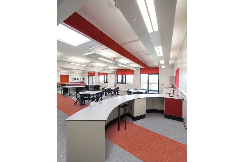 Expona Linné in grey and red at Sir Stanley Matthews School.