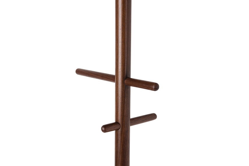 The coat stands are strongly reminiscent of a ship’s mast.