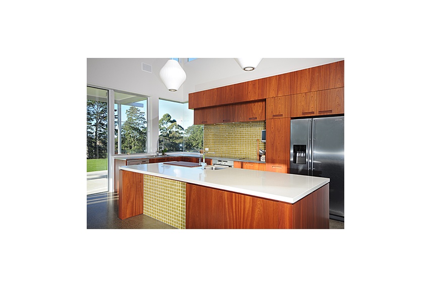 Hobsonville Kitchen – mahogany timber veneer with melamine internal carcasses, soft close drawers