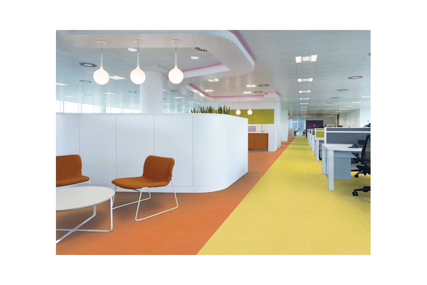 Expona Linné in orange and yellow in an office environment.
